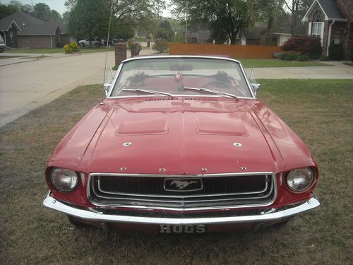 1967 ford mustang convertible, red.  fun vehicle to drive on a nice day!