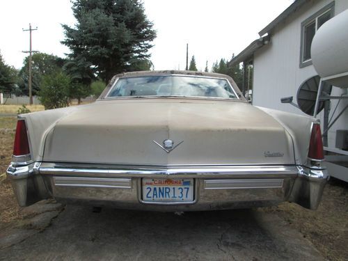 1969 cadillac coupe deville, runs well, drives. yet needs going through.