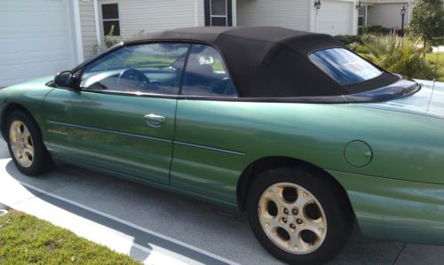 &#039;98 convertible, 6cyl, pwr seat, windows. leather, new top, 185k miles