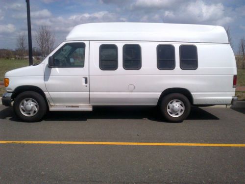 2006 ford e-250 raised roof center isle seating captains seating