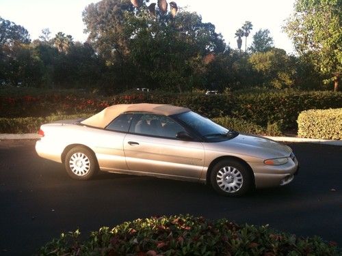 1998 chrysler sebring convertible gold - with fresh new battery, plus extras