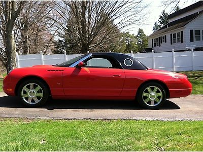 2004 ford thunderbird convertible..red..only 21,000 miles...like new!!!!!
