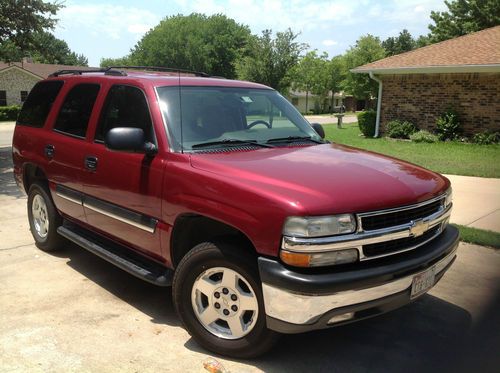 2004 chevy tahoe ls with 3rd row seating red exterior