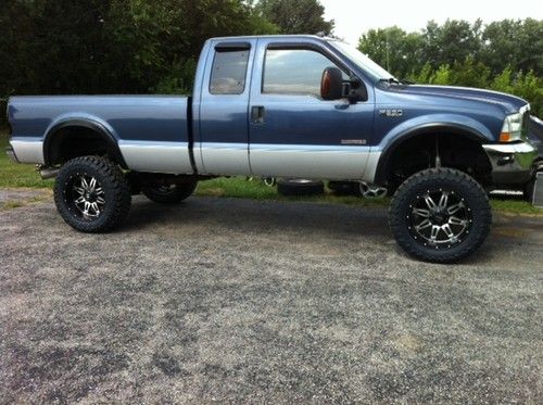 Super duty, f350 2004 xlt powerstroke, lifted, good mileage, 8 ft bed ext