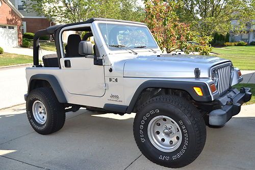 2005 jeep wrangler x . 6 speed. silver. new 33" inch tires. runs great!