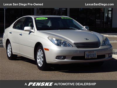 4dr sdn low miles/heated leather seats/power rear sun shade/moon roof/wood trim/