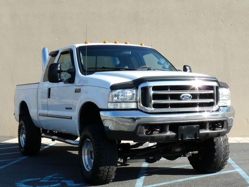 ~~00~ford~f-250~diesel~4x4~lifted~stacks~6spd~manual~7.3l~noreserve~~