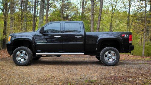 2012 gmc 2500hd crew cab denali diesel 4x4  with a 5" zone suspension lift kit