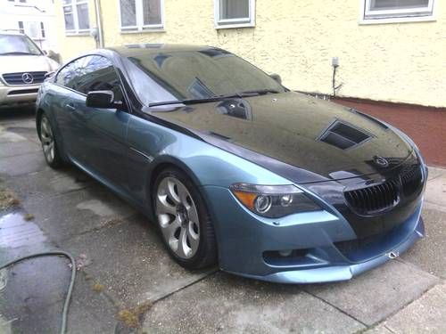 Two tone paint, 6 speed with m6 updates, salvage, light water flood, no damage