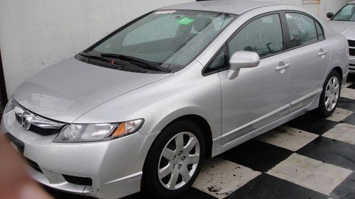 Silver 2010 honda civic lx sedan 18k milage!financing available with $2500 down!
