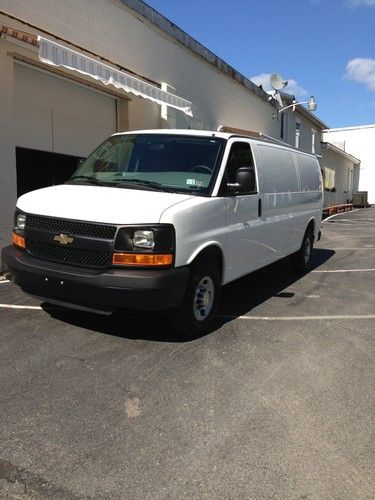 2012  white chevy extended cargo van, like new...