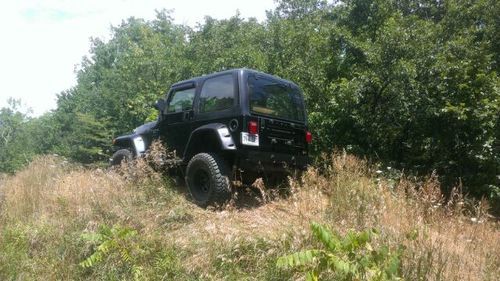 1997 jeep wrangler tj, auto, ac, 4" lift kit, 33" tires; taking a huge loss!!