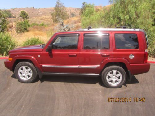 2007 jeep commander limited 4x4 all options 68,500 mi. original owner red / gray