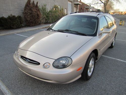 We finance! 1999 ford taurus se wagon.only 56k miles with warranty!
