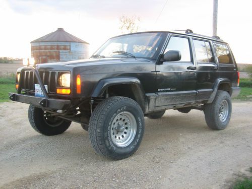 1999 jeep cherokee -  4x4 - new 3 inch rc lift - good tires - full tune up - etc