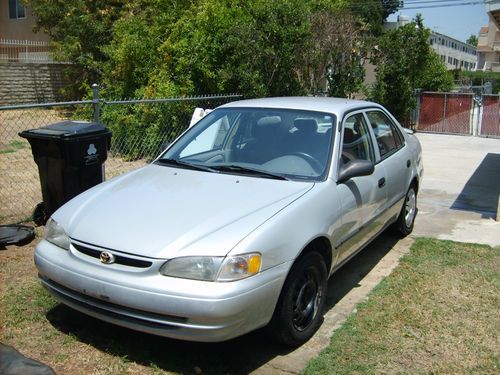 2000 toyota corolla ce, silver, power everything, automatic.