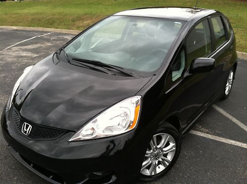 Save thousands on this honda fit sport 5 spd !!!!
