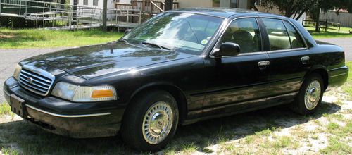 1998 - 1 owner black sedan that looks good and rides very comfortably.
