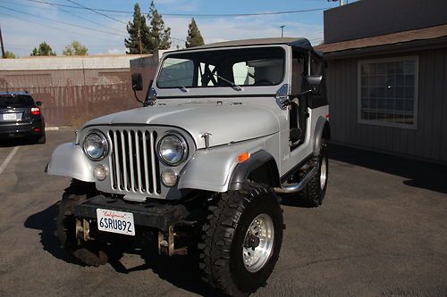 1979 jeep cj7 silver and black 4"lift  this beauty will go fast priced to sell