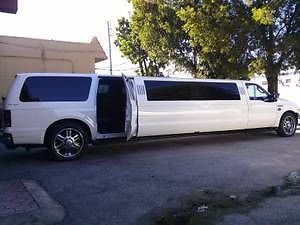 2003 white  ford excursion limousine
