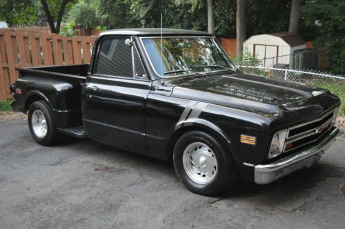 1968 chevy stepside pickup....black with shortbed 2wd