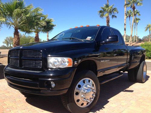 Dodge ram 3500 laramie 4x4 sport w/22.5" simi tires and wheels and new paint