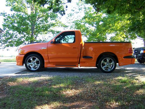 2003 ford boss pickup # 162 of a few hundred manufactured. orange