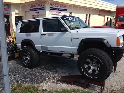 1994 jeep cherokee lifted on 35's