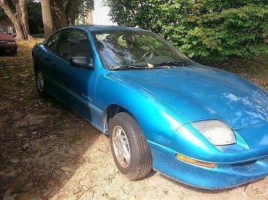 Blue-green 1998 pontiac sunfire - needs replacement engine