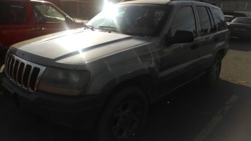 2002 jeep grand cherokee 210,810 miles key:yes  starts &amp; runs:yes engine noise