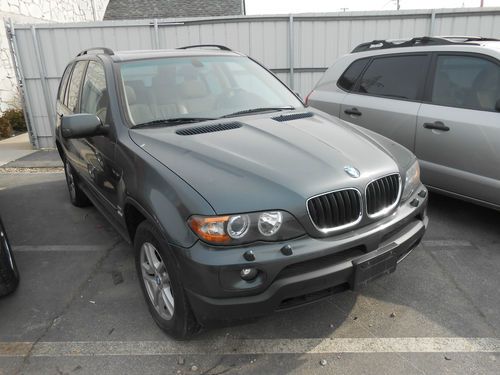 2006 bmw x5 101k miles very clean inside &amp; out loaded needs engine clean title
