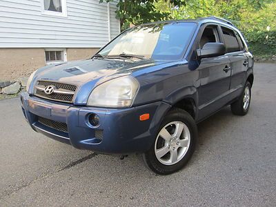 2005 hyundai tuscon**one owner**4cyl**4wd**5-speed**warranty**low miles!!!