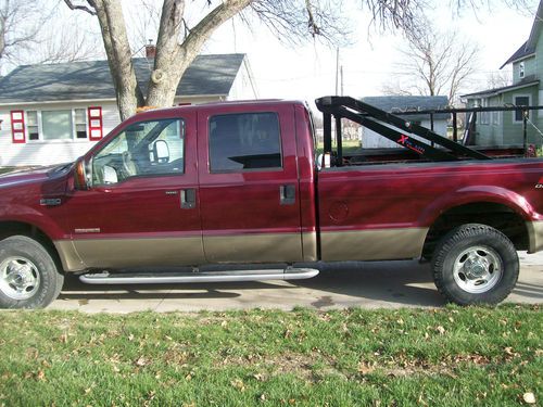 2004 ford f350 6.0l diesel crew cab long box w/lift, replaced engine