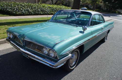 1961~original 'jadestone green metallic' with matching tri-color blue interior!