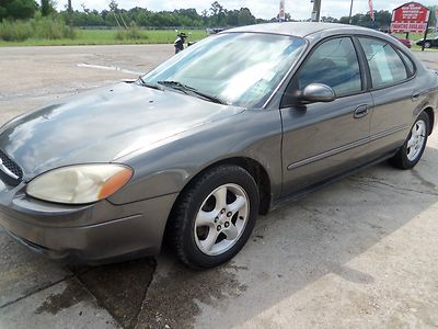 2003 ford taurus, grey, very roomy, runs great, strong engine, no reserve