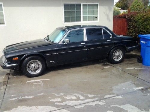 This is a 1986 jaguar xj6 it does run. it can be used for parts . some rust