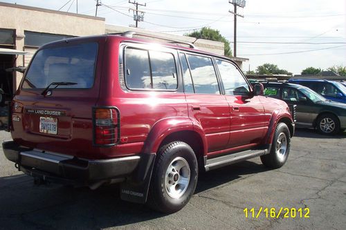 Land cruiser , 4x4 , 96k low miles, clean title w/ auto check report,