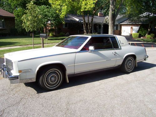1984 cadillac elorado biarritz white exterior with stainless roof &amp; red interior