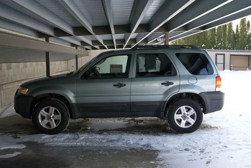 2007 ford escape hybrid light green runs and drives great no accidents
