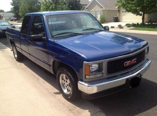 Gmc sierra 1500 2 door king cab; blue exterior with attached work box