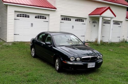Jaguar 2003 x-type 91,400 miles; v-6, 5 speed, awd garaged, well maintained!!