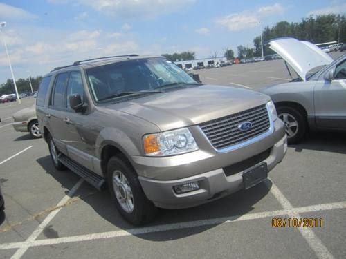 2003 gold ford expedition xlt 4.6 with new engine (under 12,000 miles)