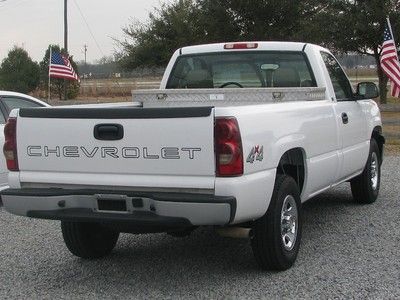 Very low miles (52,000) 4 x 4 chevy truck v-8, new stereo/cd player, tool box