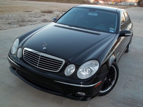 467 horsepower supercharged e55 amg with panoramtic roof, navigation.
