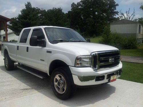 2006 f-350 4x4 fx4  lariat  long bed 4 doors  bed has ball hitch