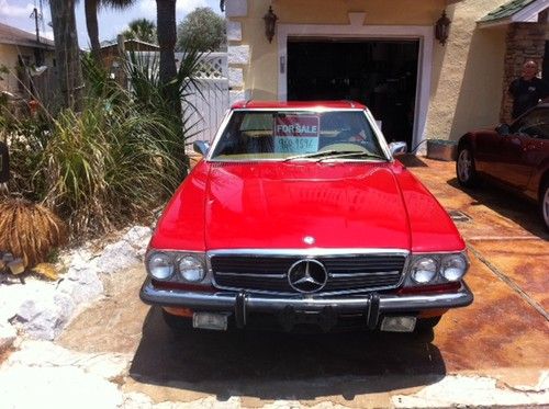 1973 mercedes 450sl, red w/ classic euro bumpers being restored