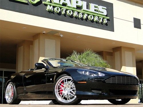 Jet black exterior, w/ obsidian black interior, bluetooth, red painted calipers,