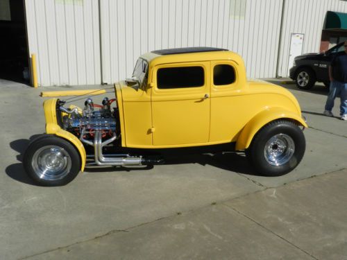 1932 yellow 5 window coupe