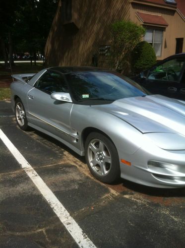 Silver 184,000 miles runs great upgrades not stock leather t-tops