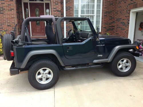 2002 jeep wrangler - lots of extras - very low miles 68.5k - 2 inch lift